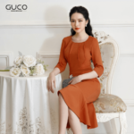 GUCO – Đầm nữ dự tiệc tay lửng màu cam chân váy đuôi cá 2715